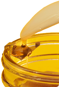 Honigglas mit Löffel